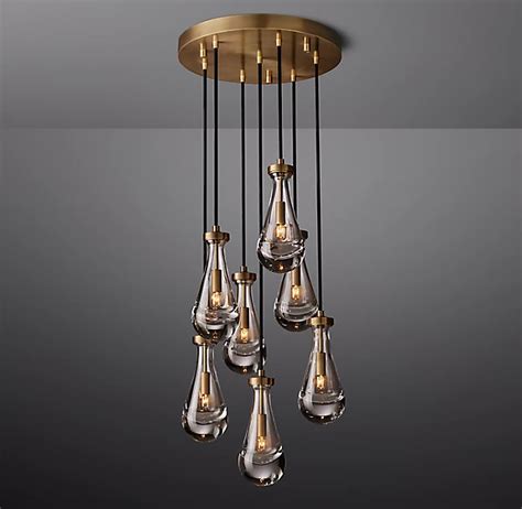 From Restoration Hardware: "The form of a Beaux Arts <strong>chandelier</strong> is reinterpreted in solid brass by renowned lighting designer Jonathan Browning. . Rh rain chandelier